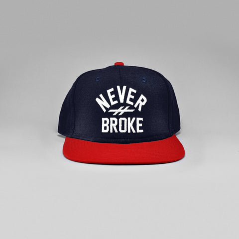 NEVER BROKE SNAPBACK HAT (NAVY)